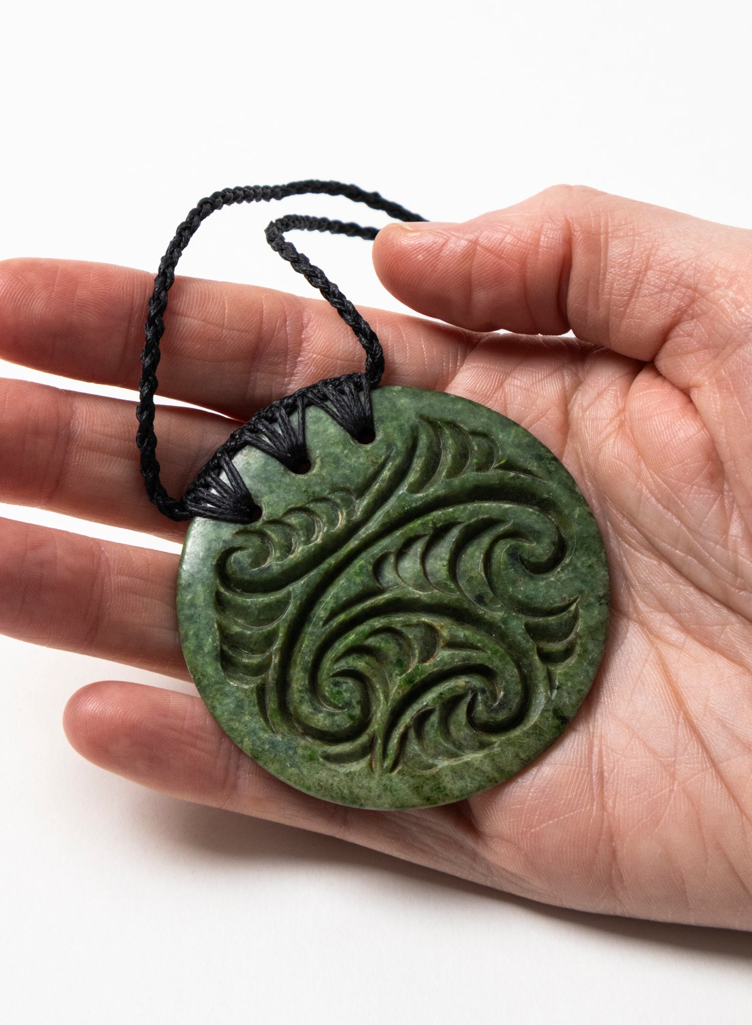 Carved Pounamu Porowhita Disc
