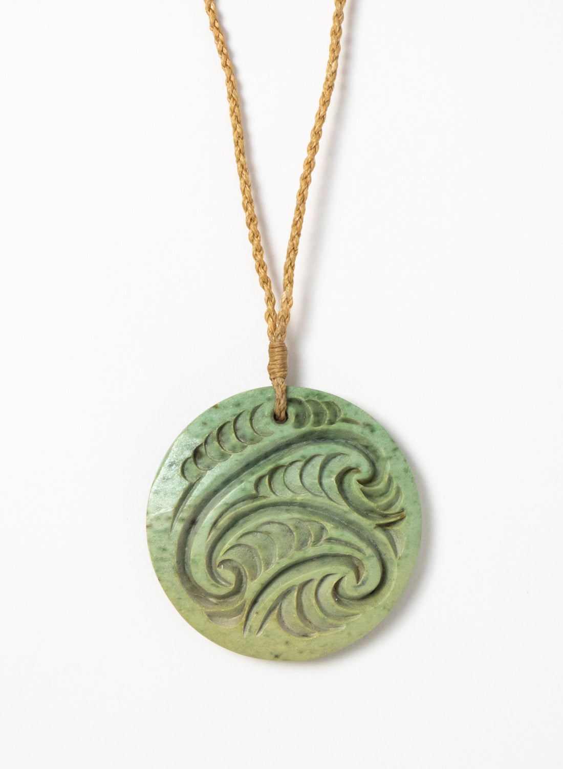 Carved Pounamu Porowhita Disc