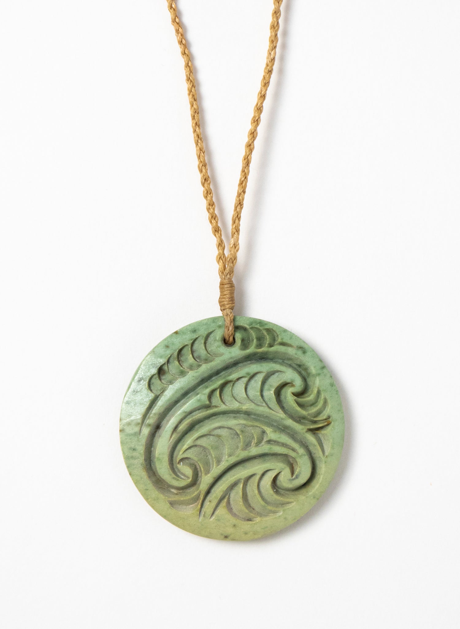 Carved Pounamu Porowhita Disc