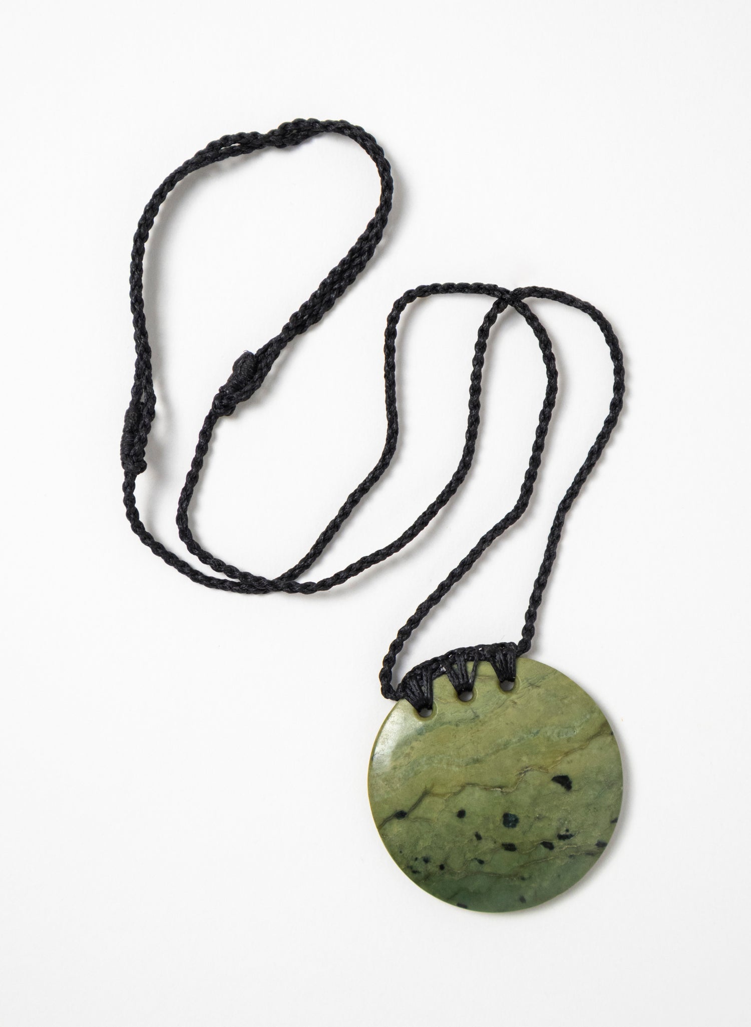Carved Pounamu Porowhita Disc