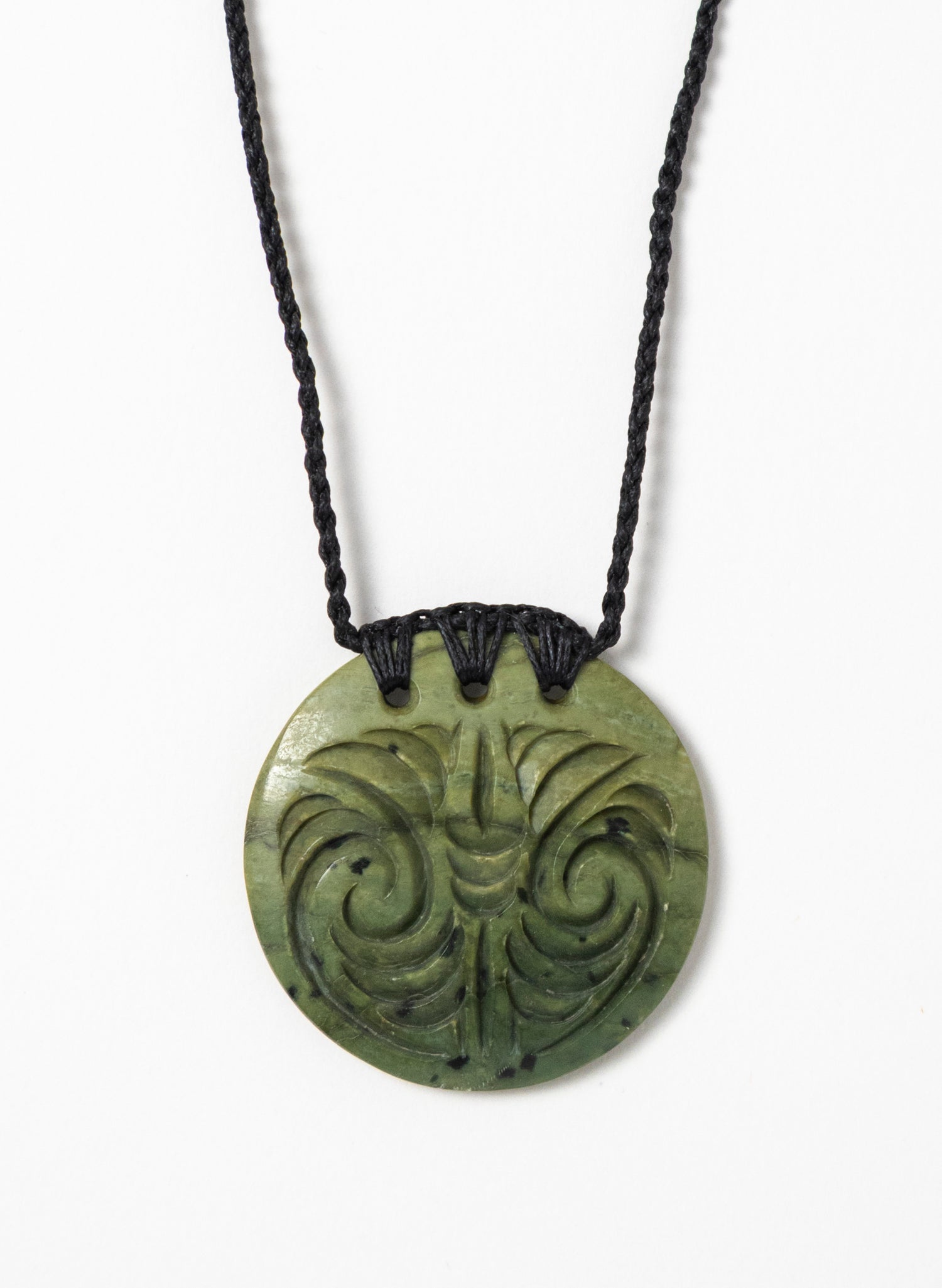Carved Pounamu Porowhita Disc