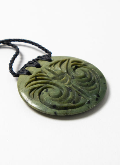 Carved Pounamu Porowhita Disc