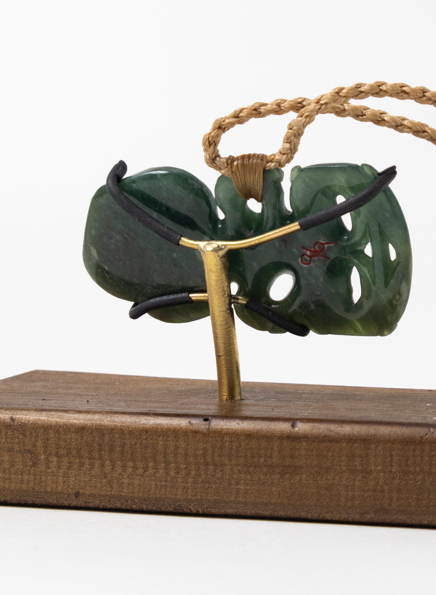 Hiwa-i-te-rangi Hei Tiki on Stand