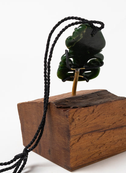Tupuānuku Hei Tiki on Stand