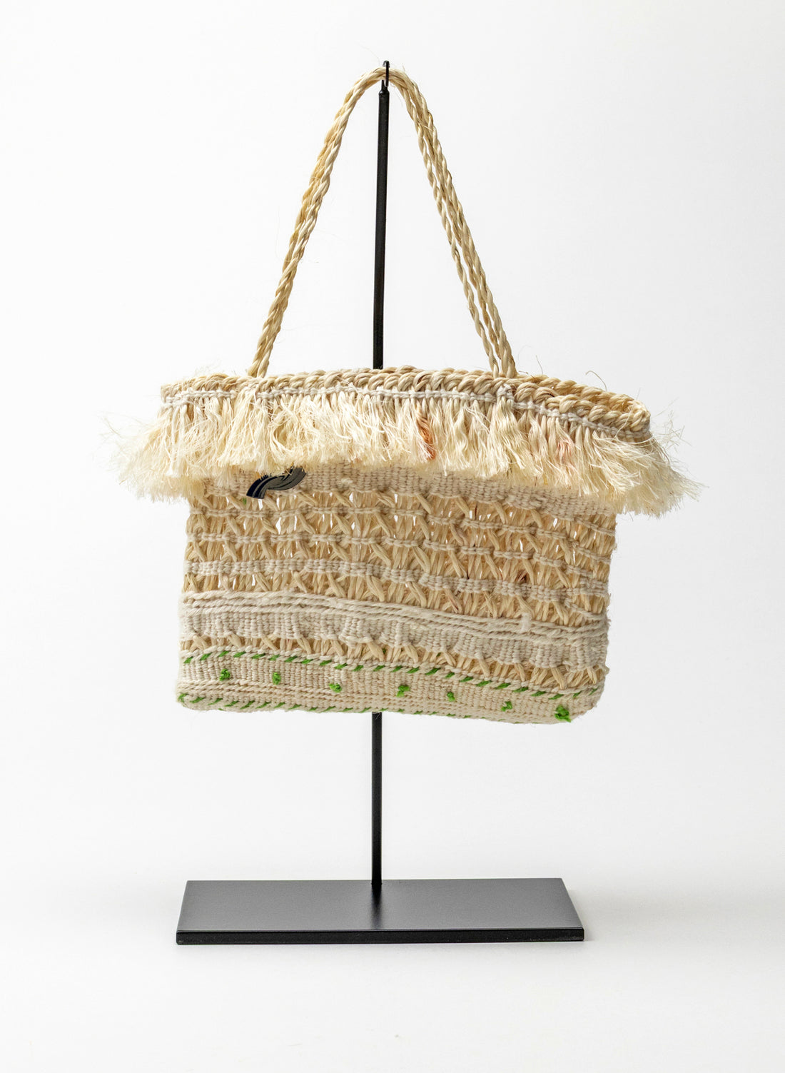 Muka Kete on a Stand