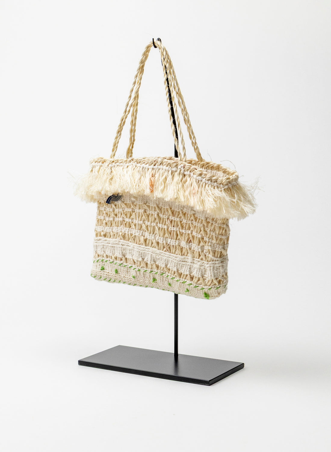Muka Kete on a Stand