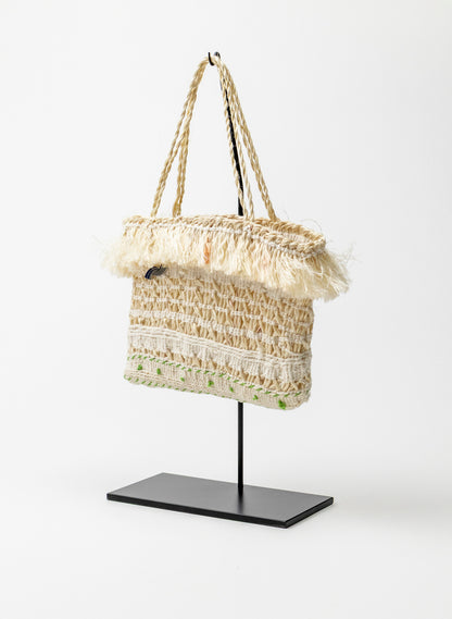 Muka Kete on a Stand
