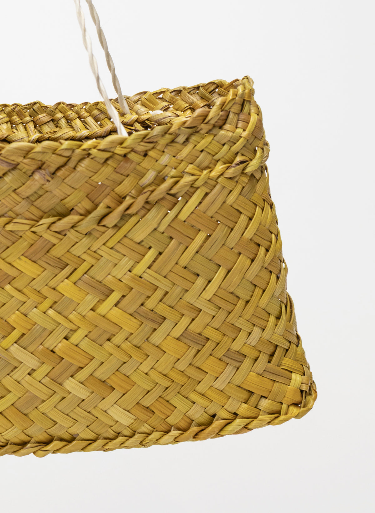 Pingao Kete on a stand