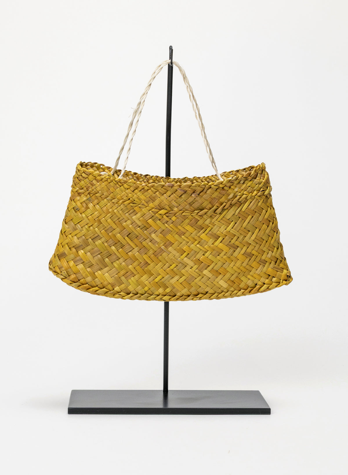 Pingao Kete on a stand