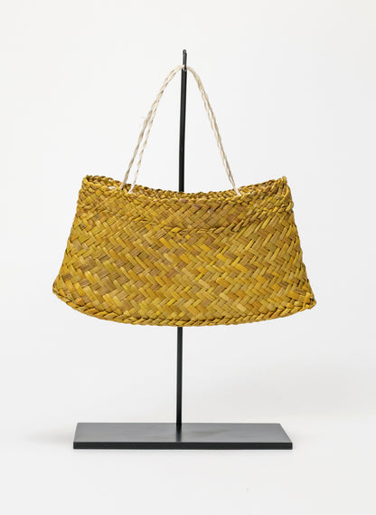 Pingao Kete on a stand