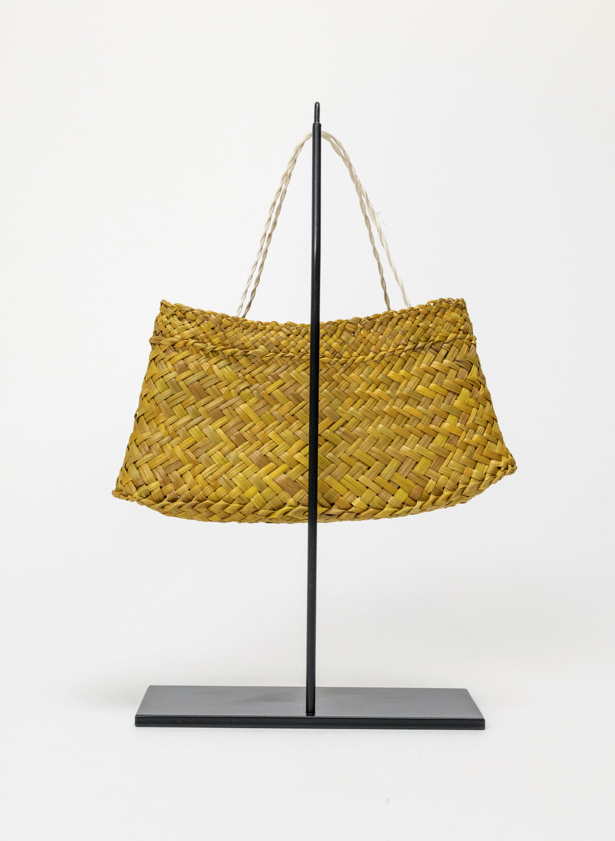 Pingao Kete on a stand
