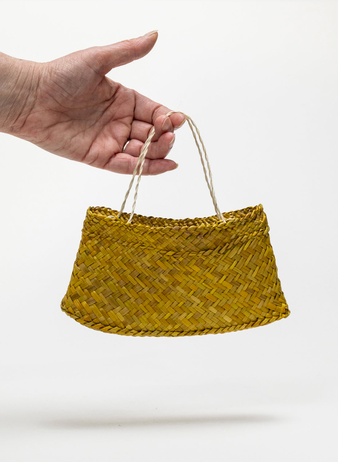 Pingao Kete on a stand