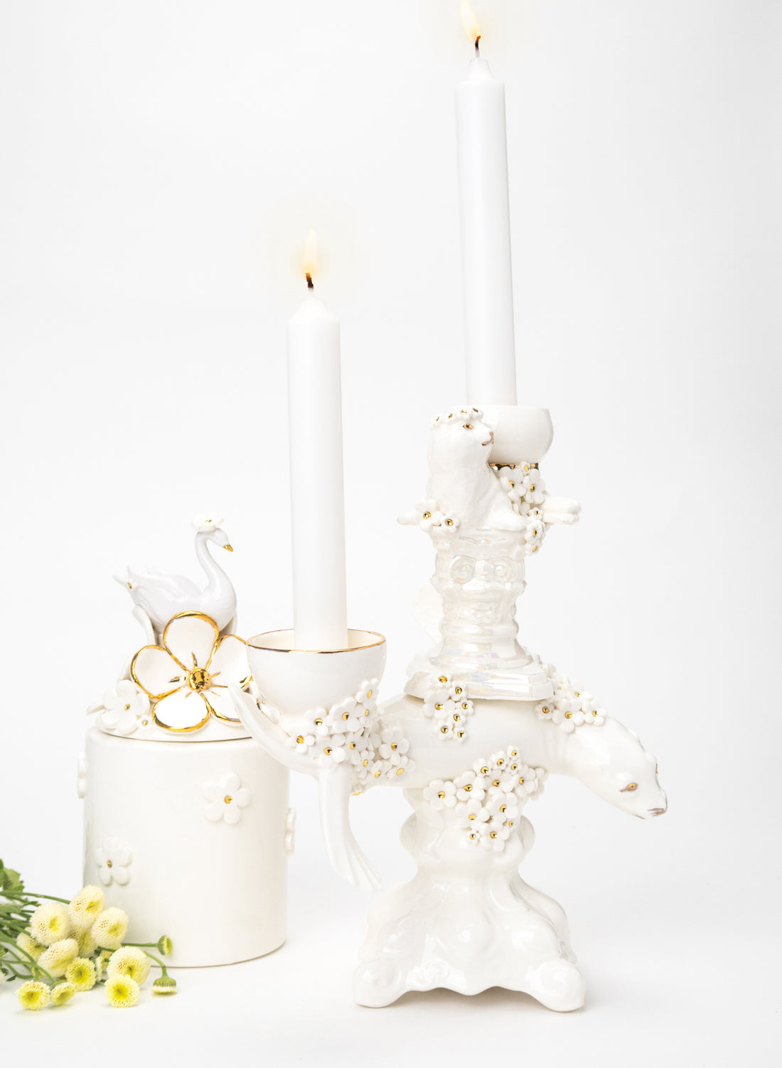 Seal Candlestick with White and Gold Flowers