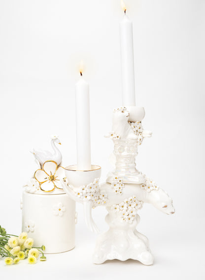 Seal Candlestick with White and Gold Flowers