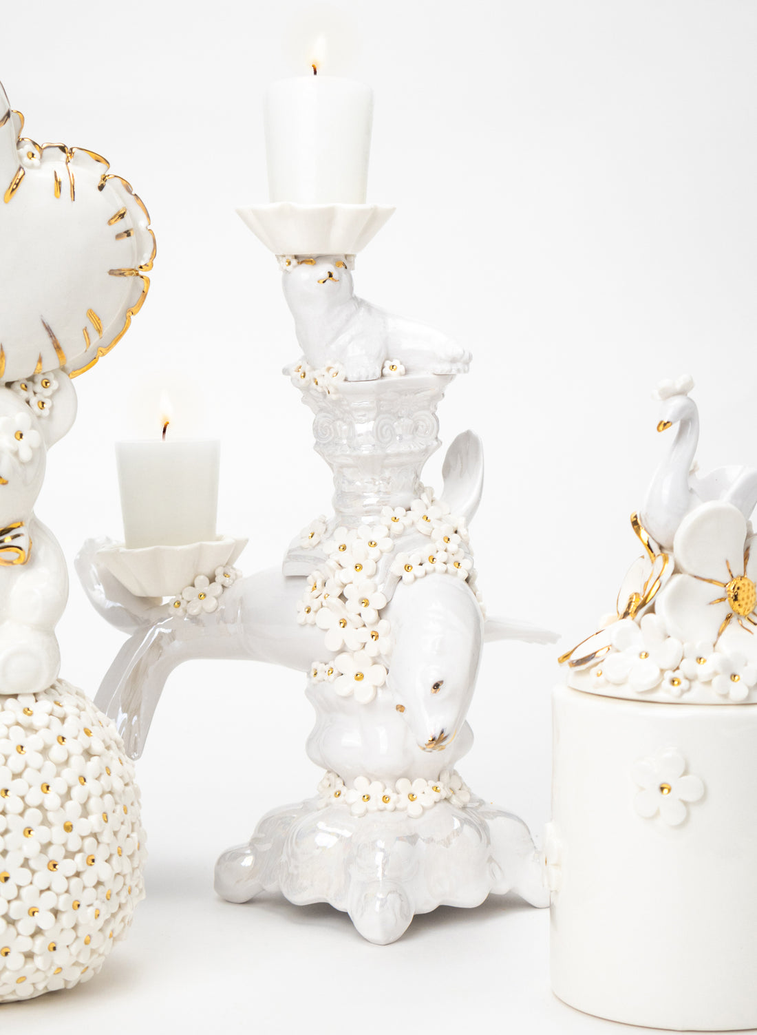 Seal Candlestick with White and Gold Flowers