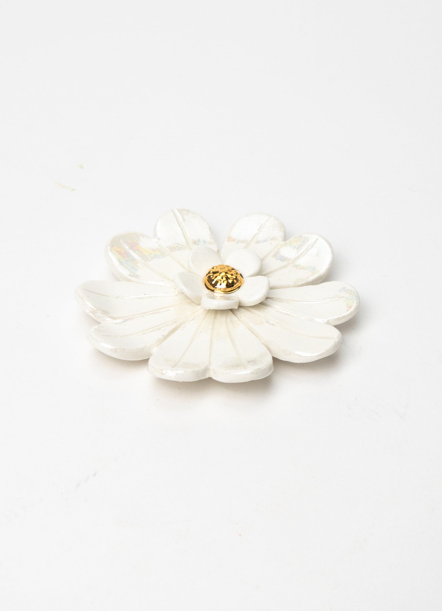 White Incandescent Wall Flower with Golden Pistil