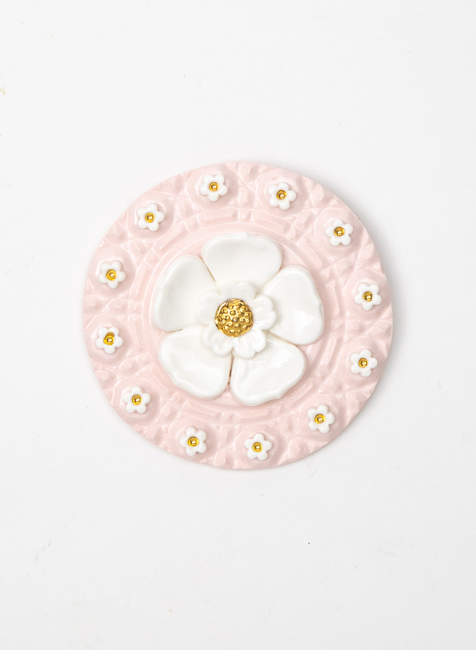 Round Pink Wall Plate with White and Gold Flowers