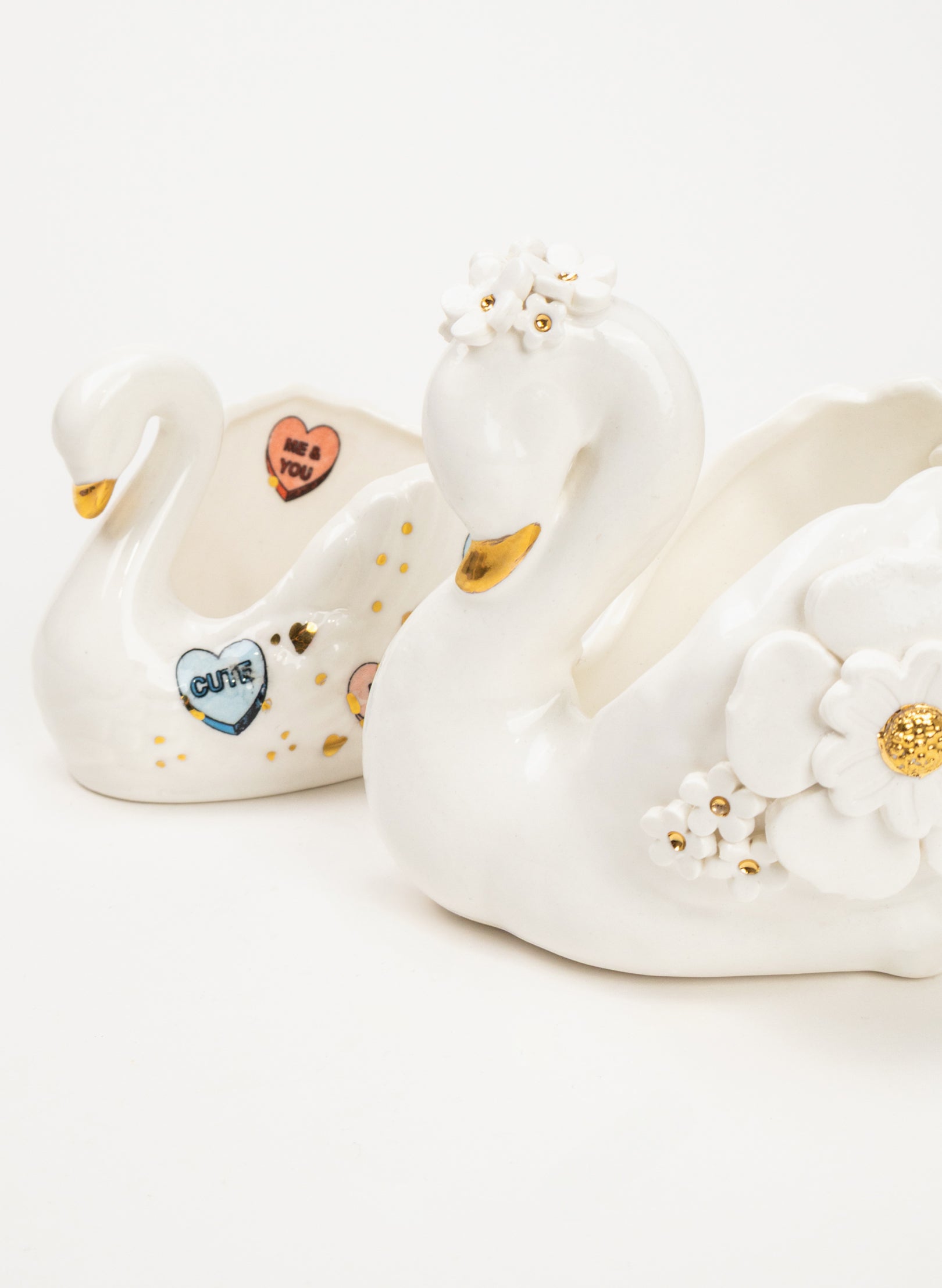 Swan with Gold and White Flowers