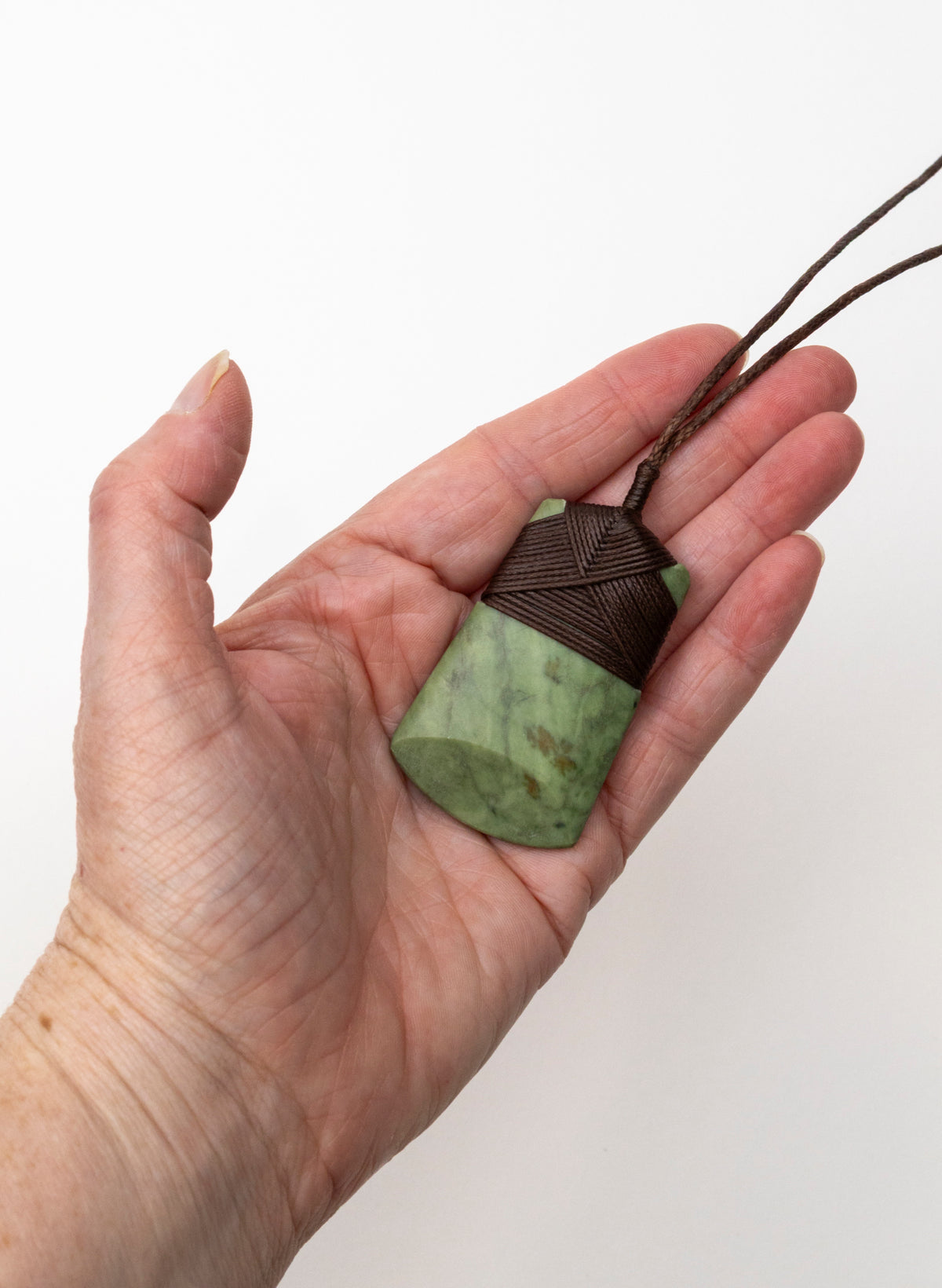 Raukaraka Pounamu Cross Bound Toki Pendant