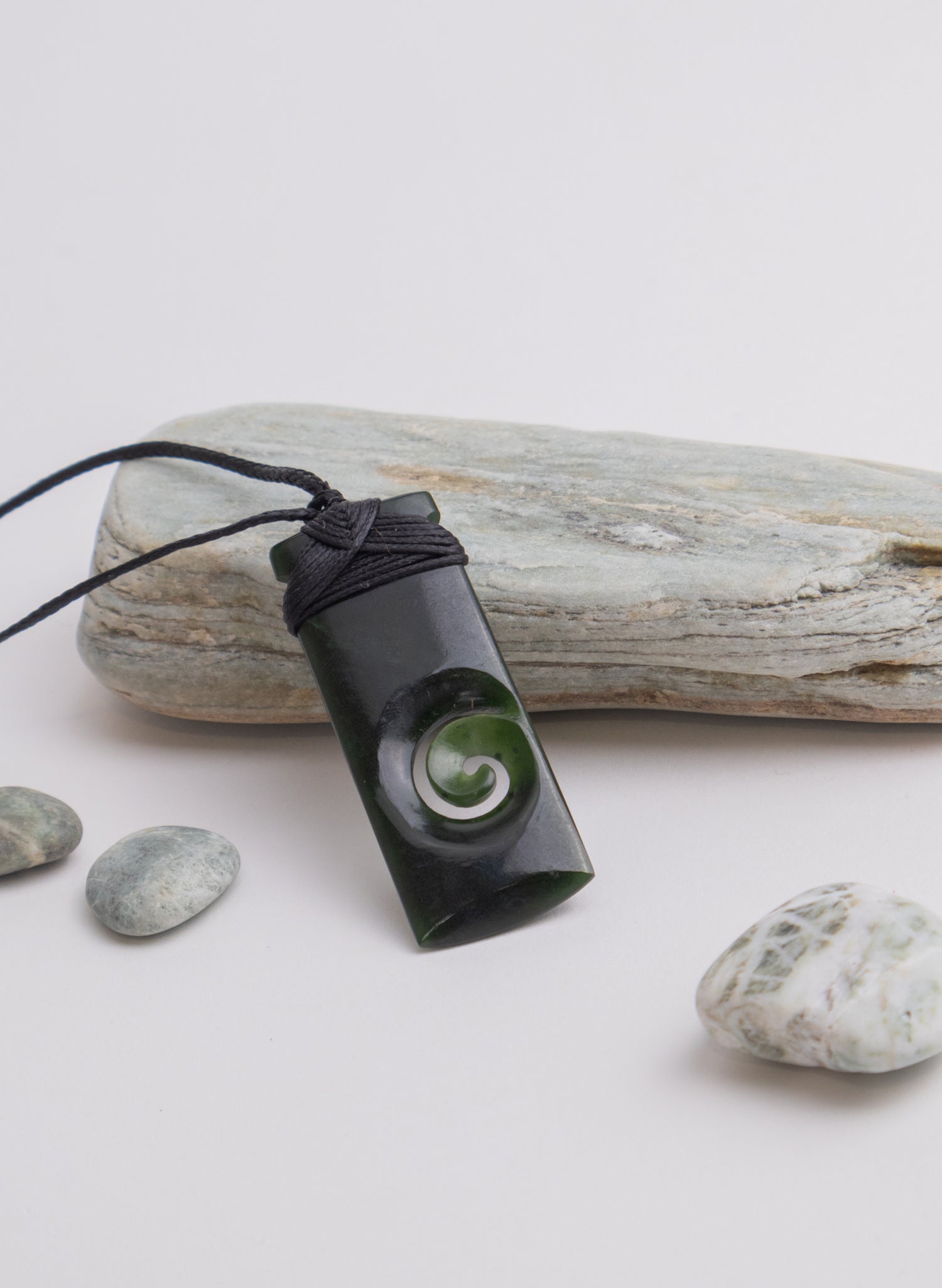 Bound Pounamu Toki with Koru