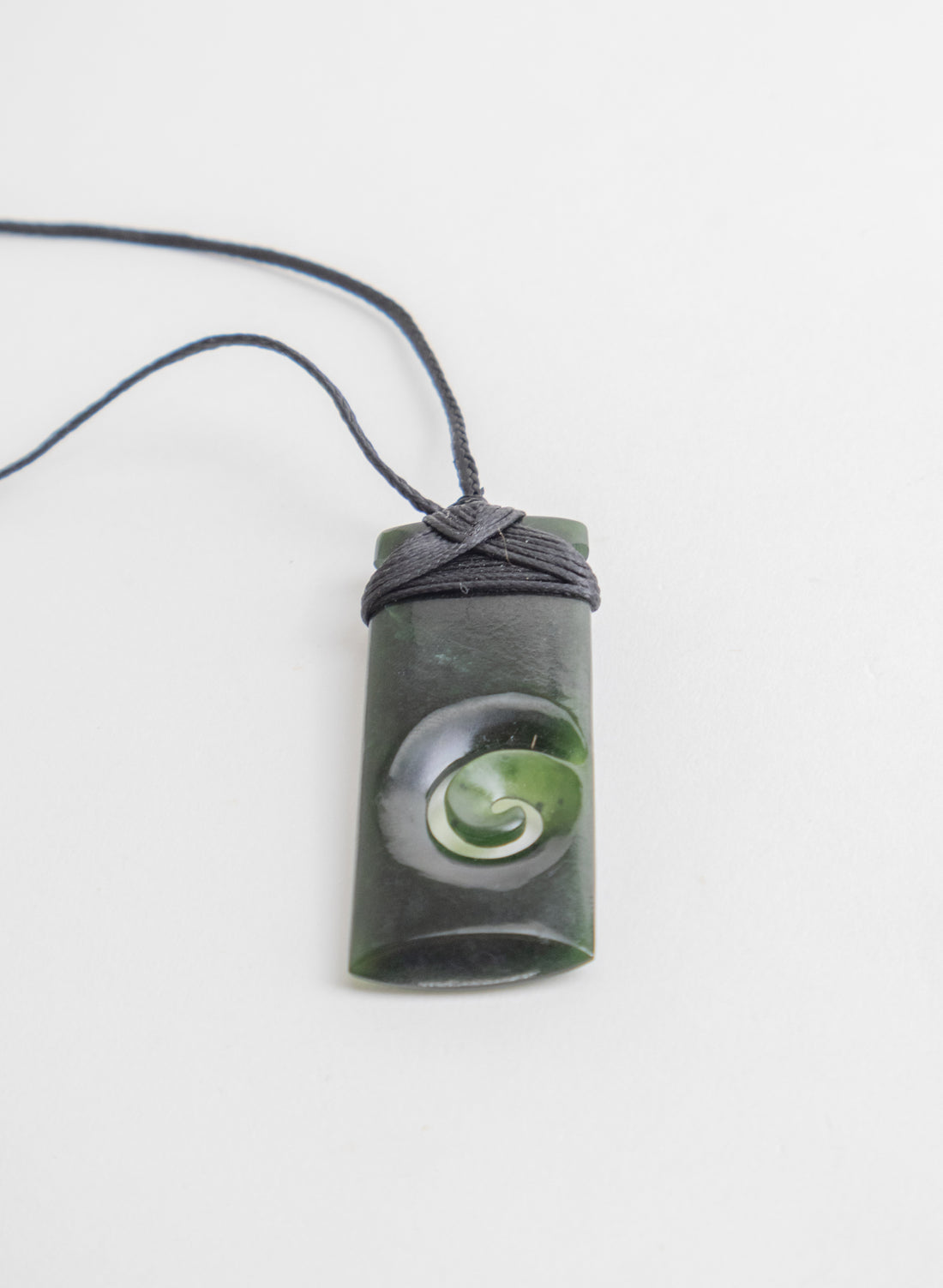 Bound Pounamu Toki with Koru