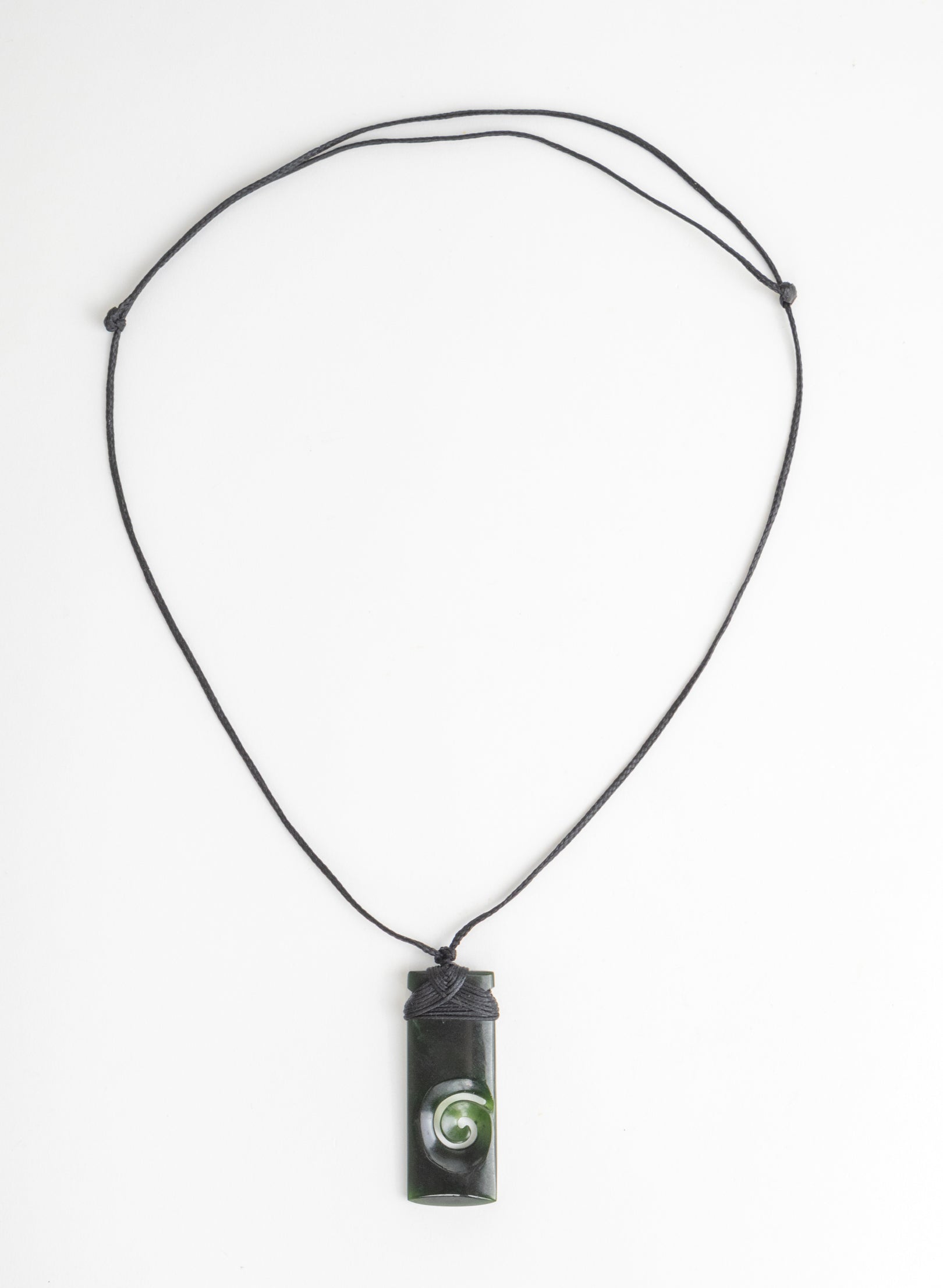Bound Pounamu Toki with Koru