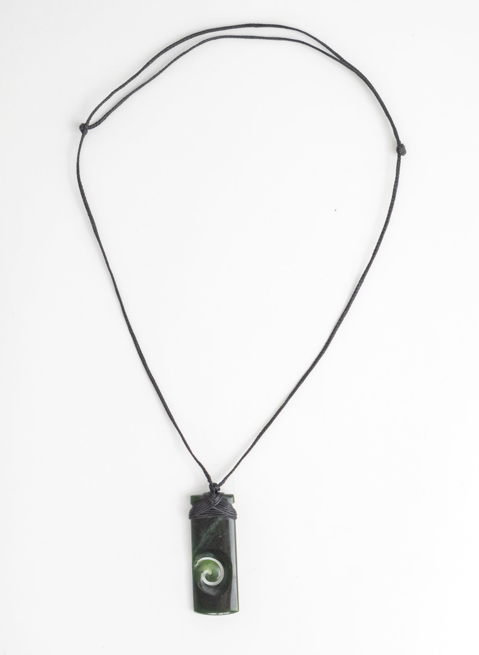 Bound Pounamu Toki with Koru