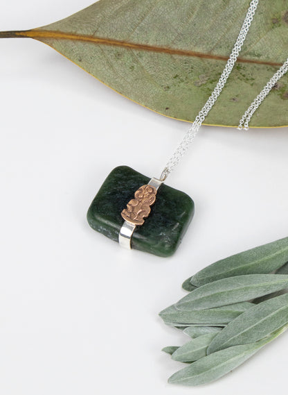 Down to Earth Tiki Pendant Necklace