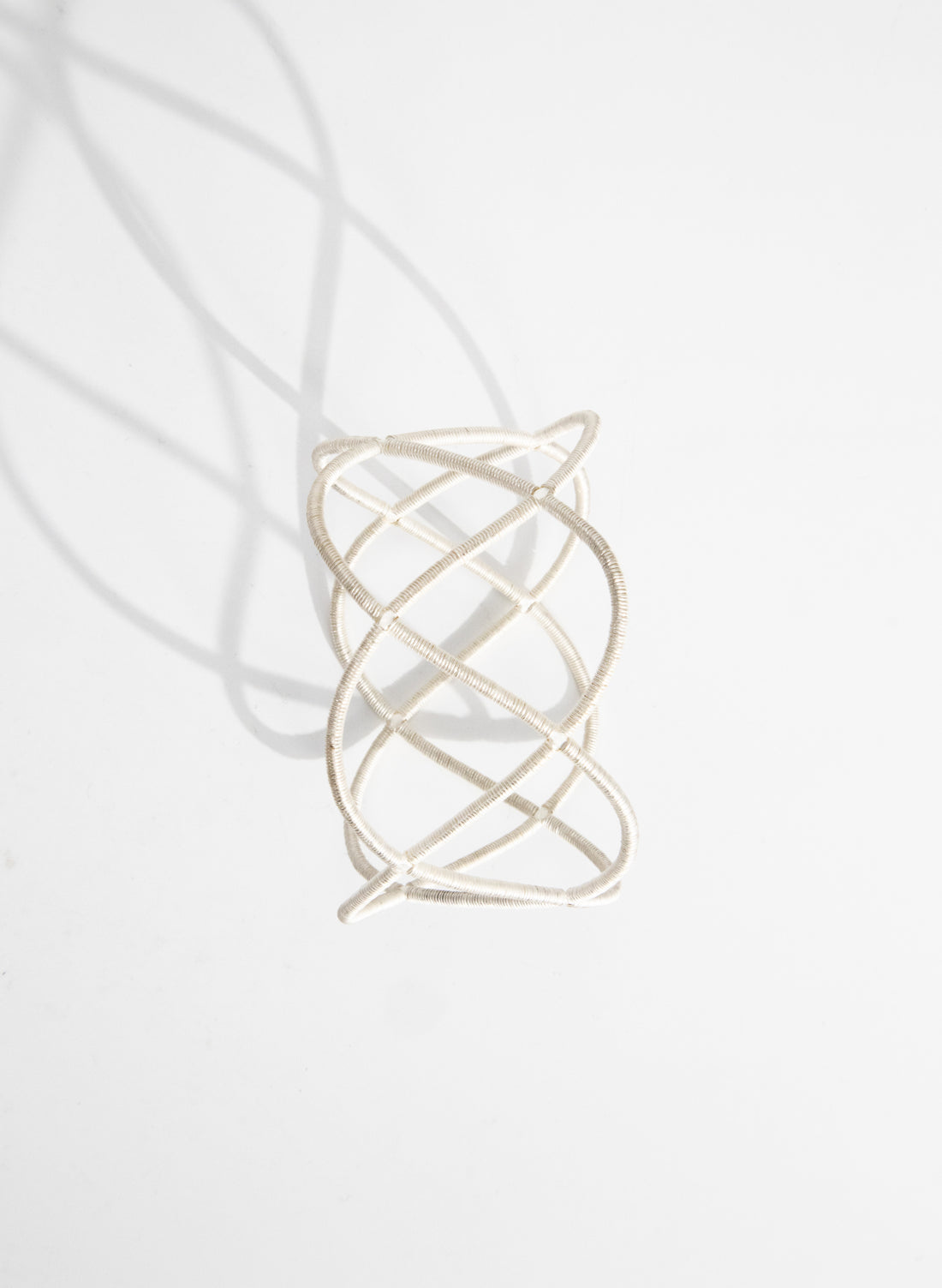 Triple Twist Silver Bangle