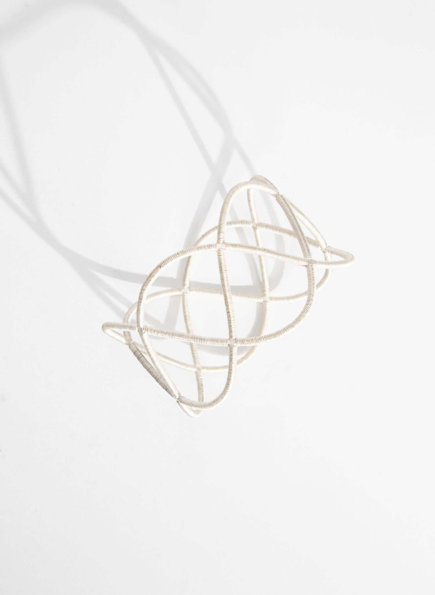 Triple Twist Silver Bangle