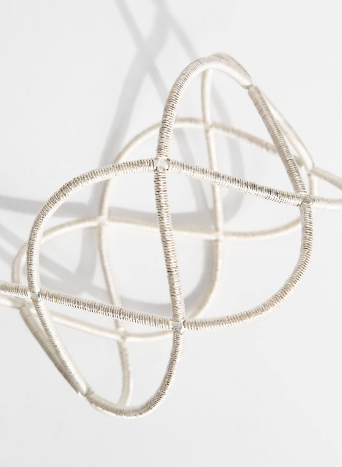 Triple Twist Silver Bangle