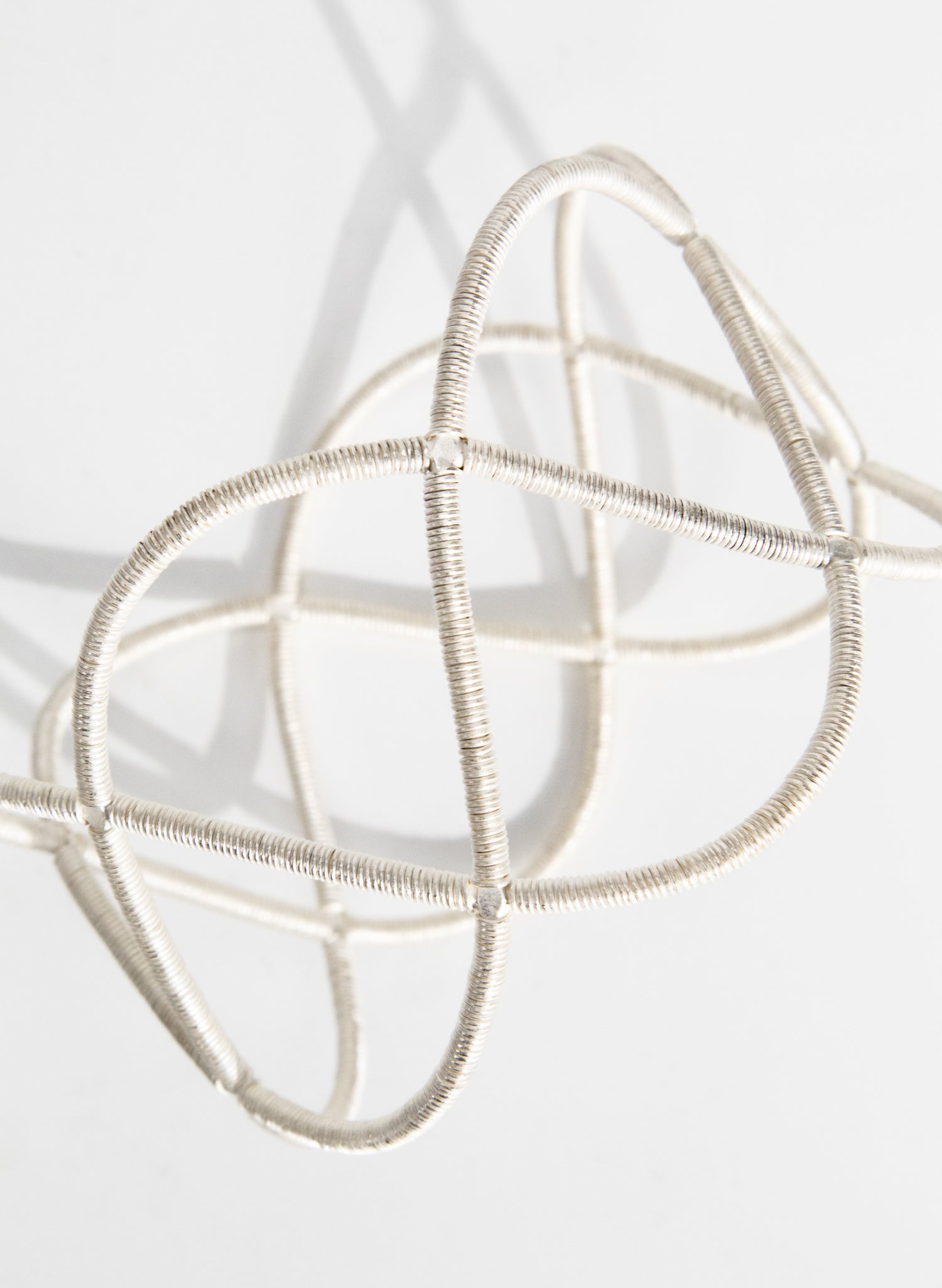 Triple Twist Silver Bangle