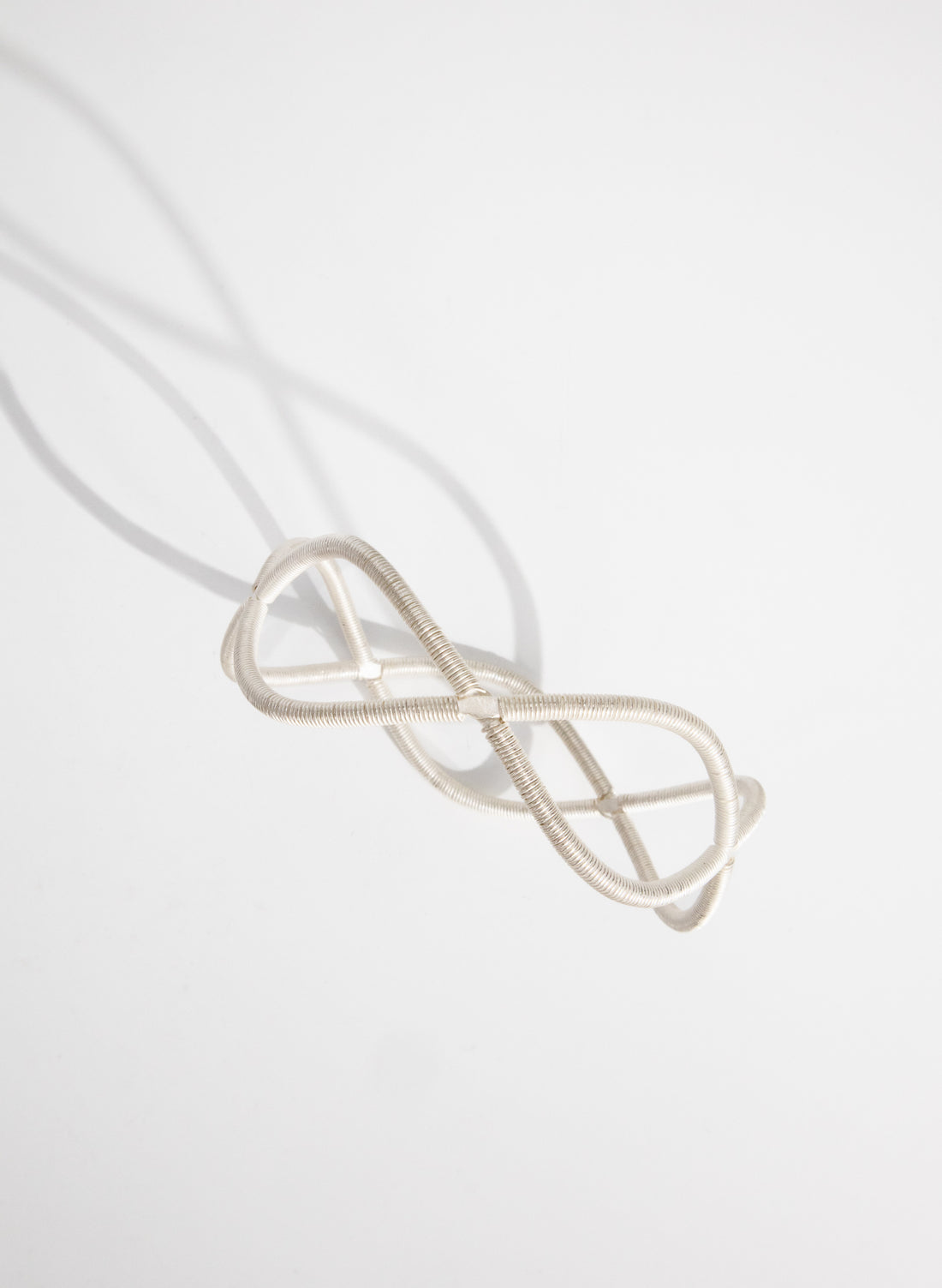 Double Twist Silver Bangle