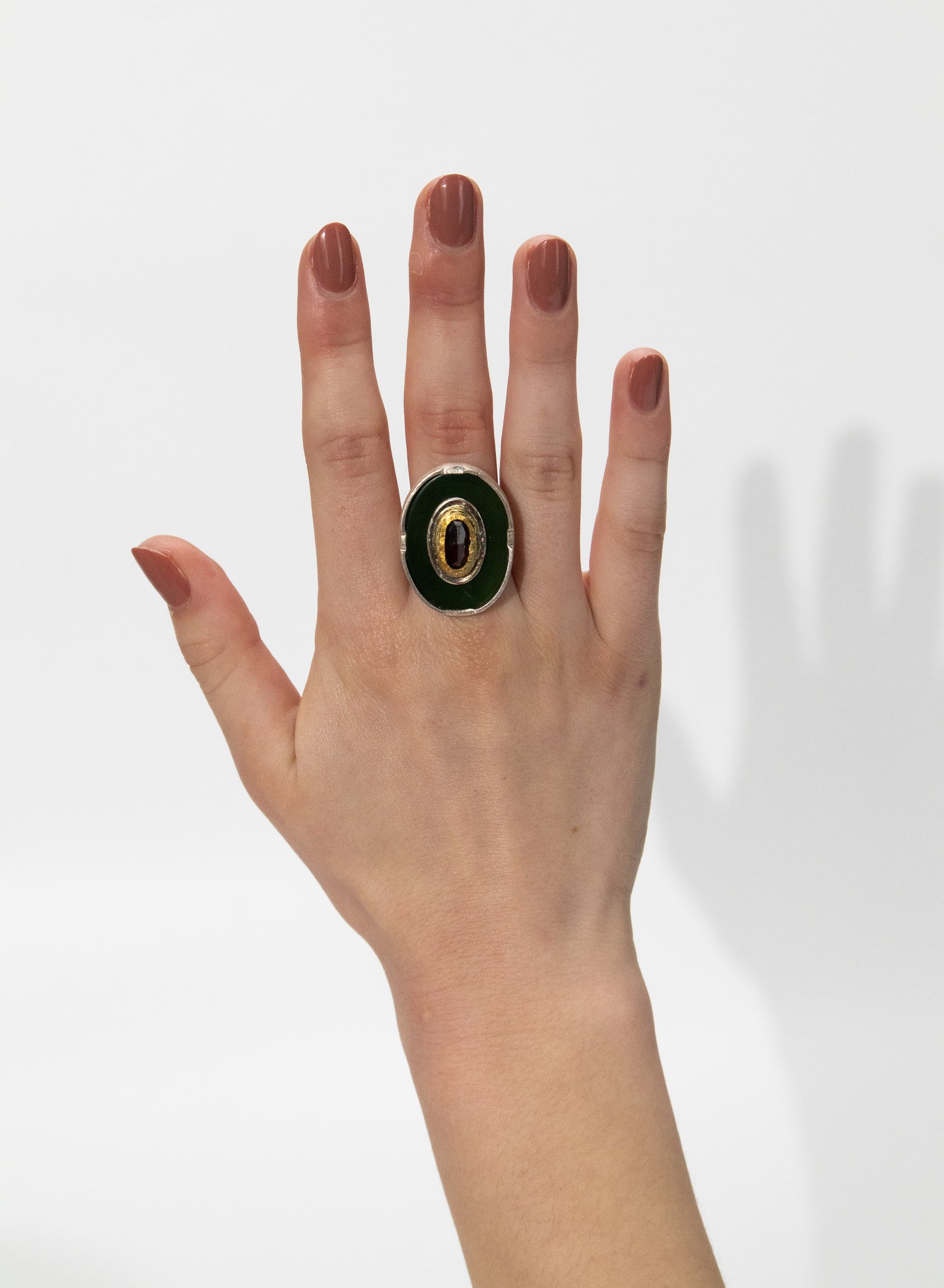 New Zealand Jade Pounamu, 24 ct Gold, Garnet and Sterling Silver Ring