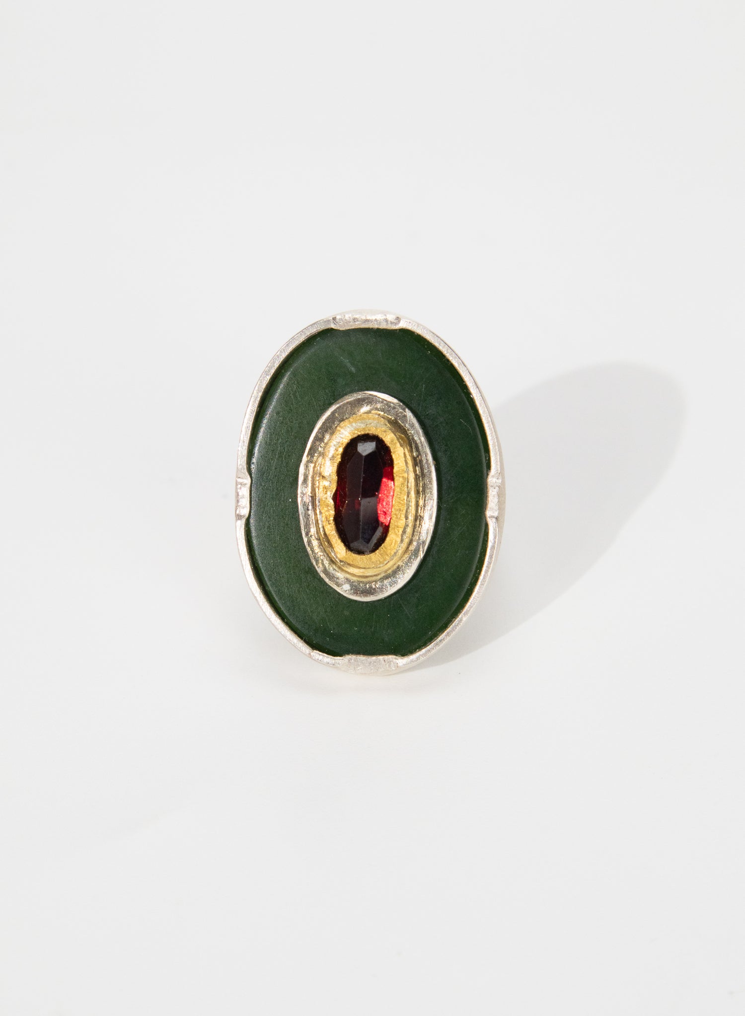 New Zealand Jade Pounamu, 24 ct Gold, Garnet and Sterling Silver Ring