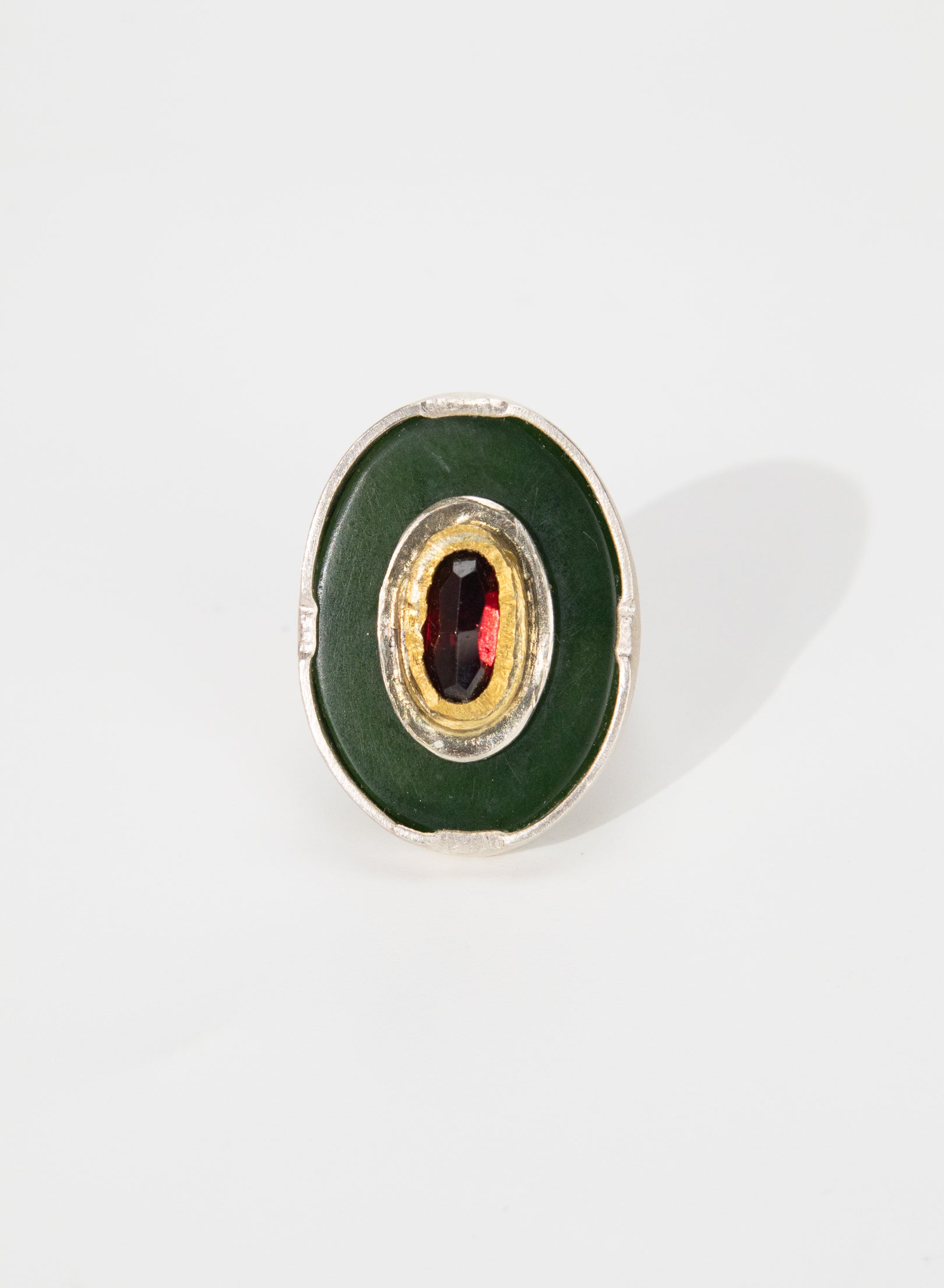 New Zealand Jade Pounamu, 24 ct Gold, Garnet and Sterling Silver Ring