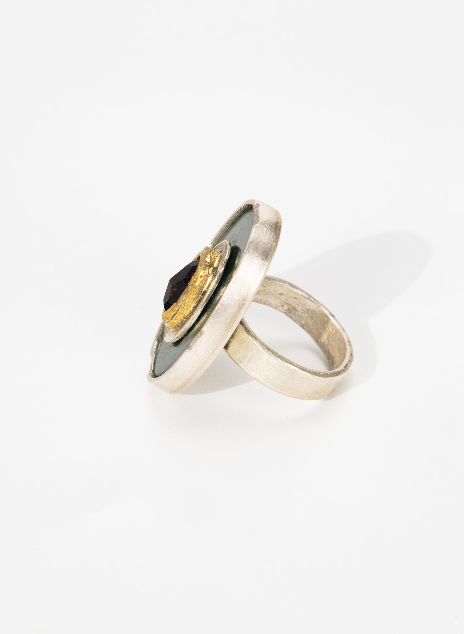 New Zealand Jade Pounamu, 24 ct Gold, Garnet and Sterling Silver Ring