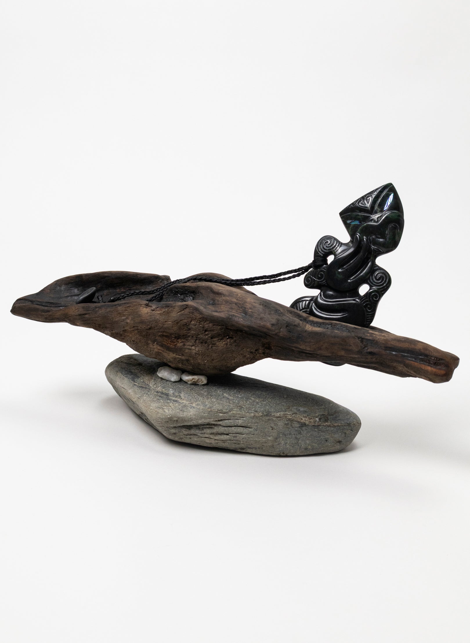Pounamu Hei Tiki on Stone Base