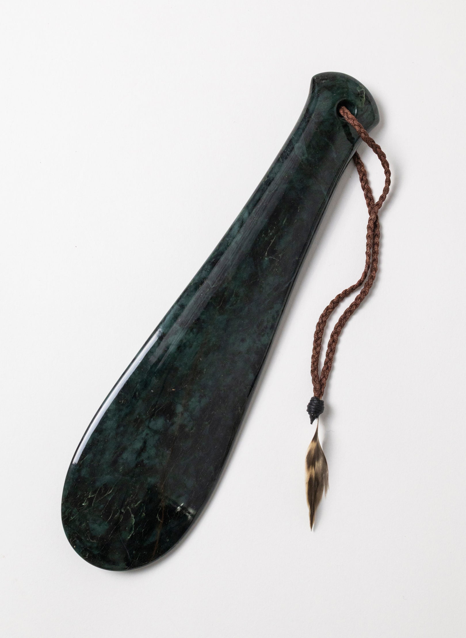 Mere Pounamu on Stone Base