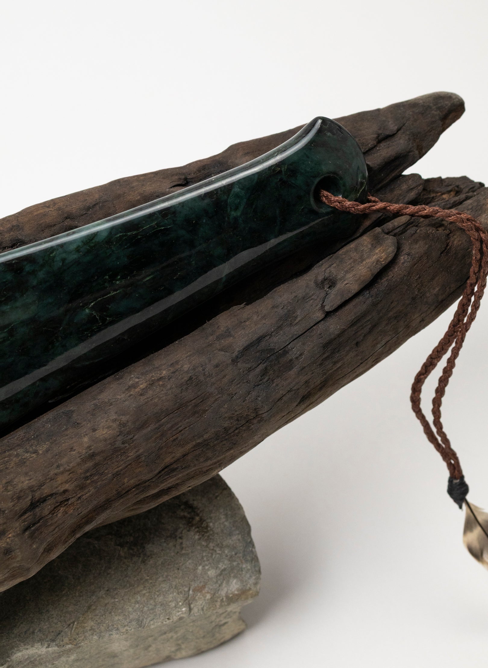 Mere Pounamu on Stone Base