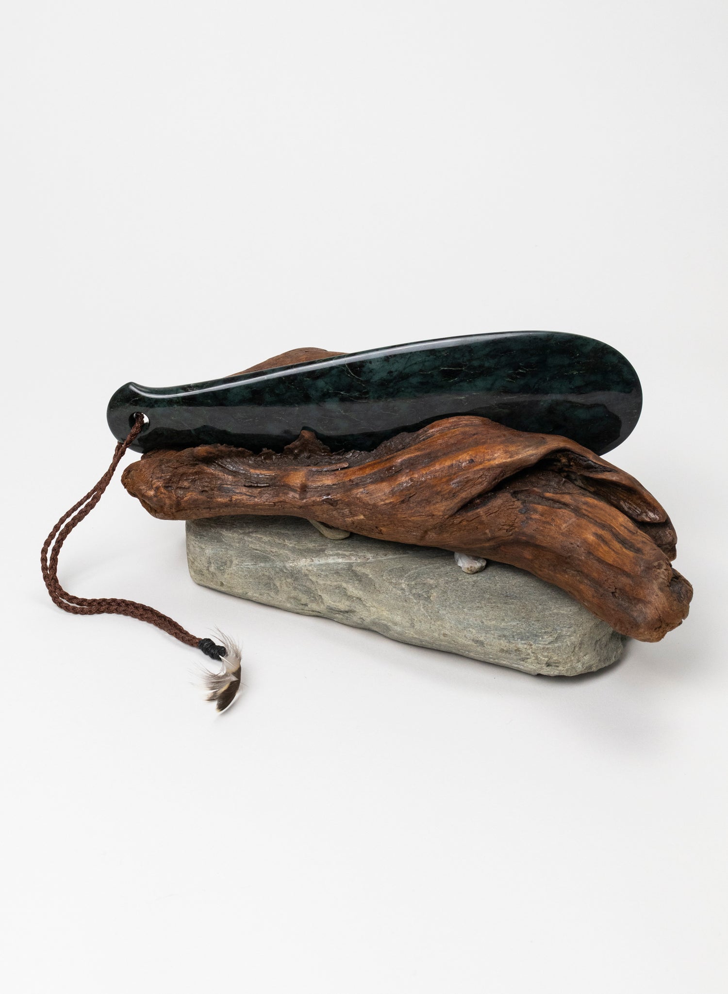 Mere Pounamu on Stone Base