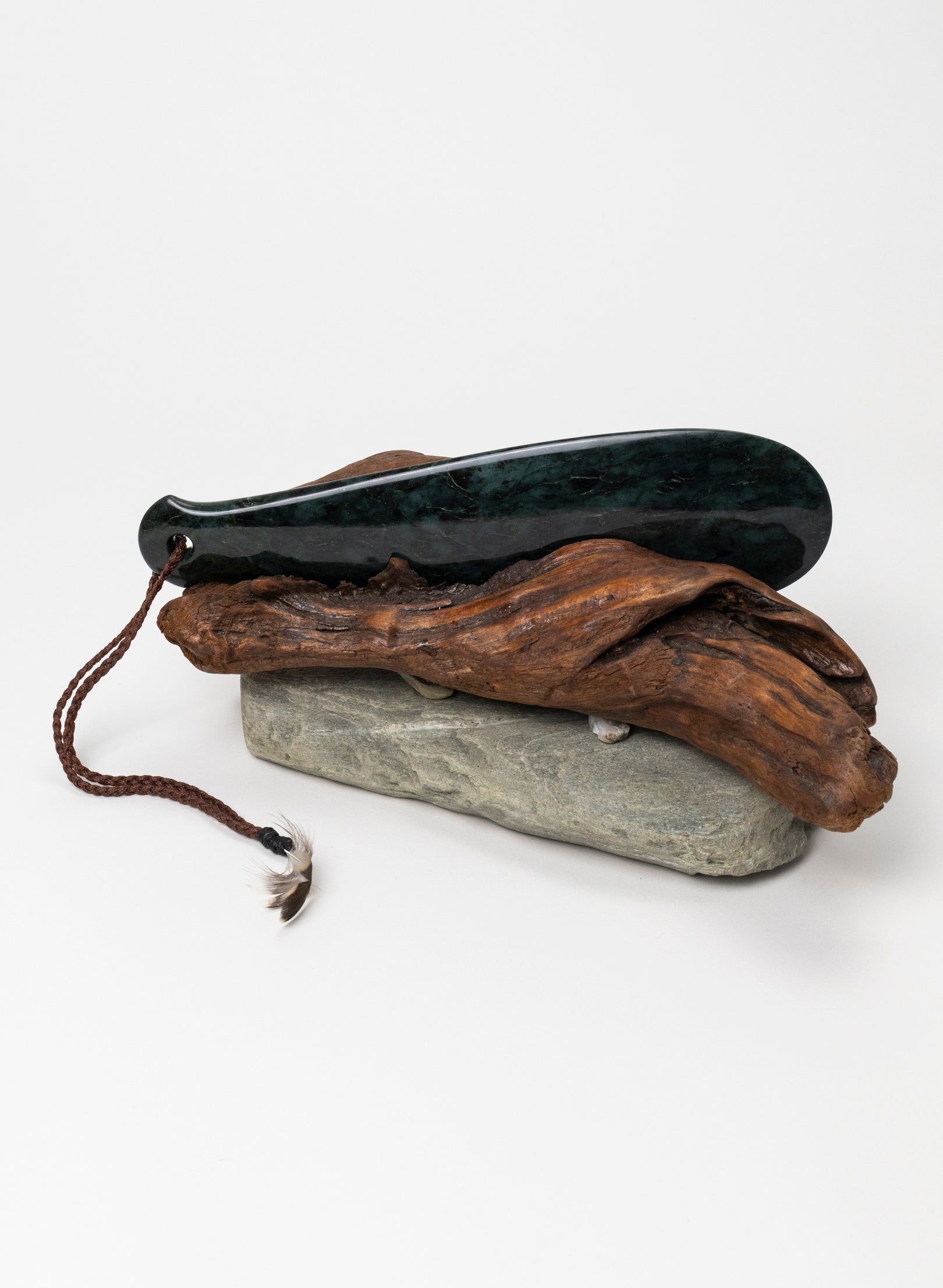Mere Pounamu on Stone Base
