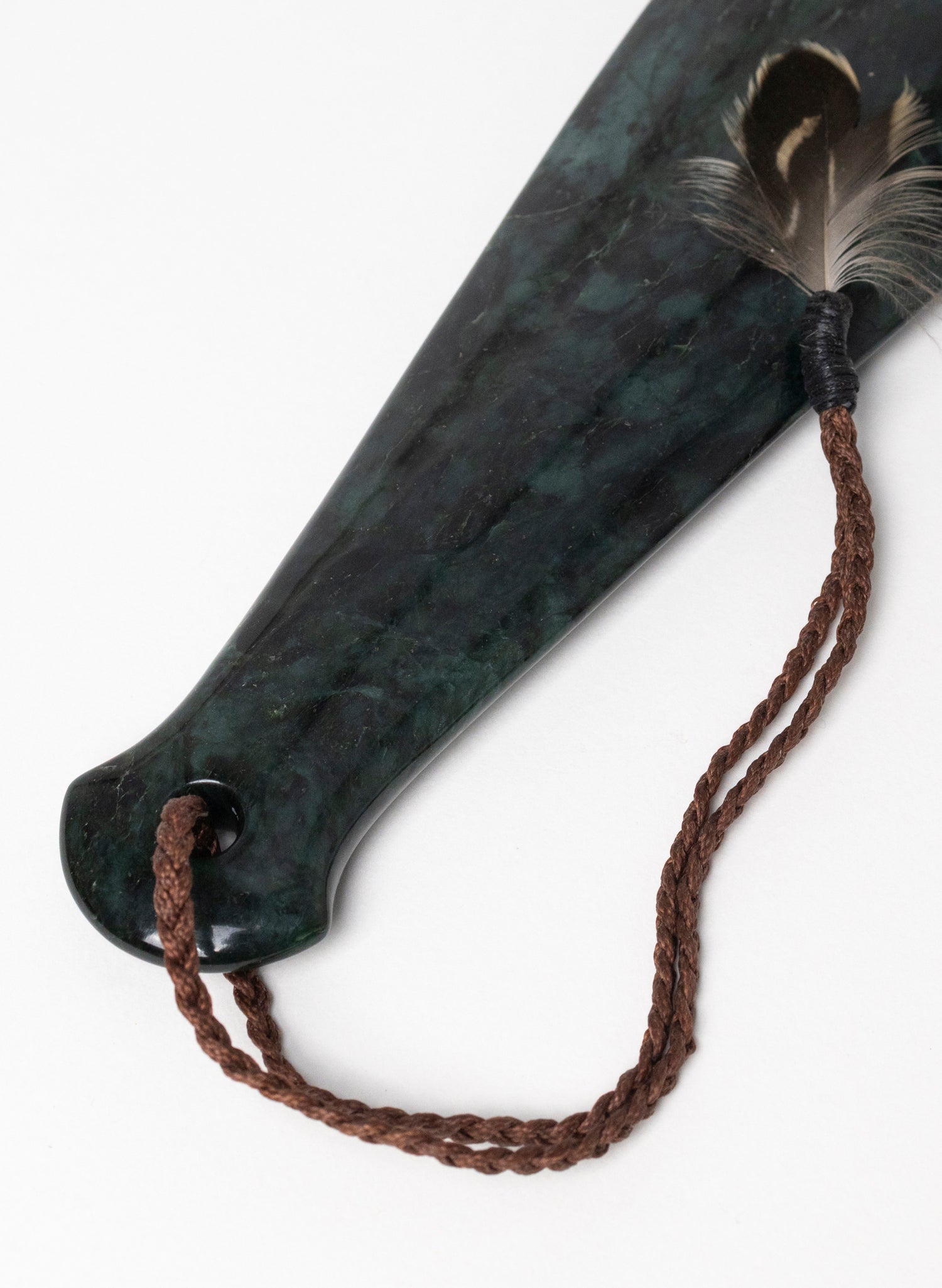 Mere Pounamu on Stone Base