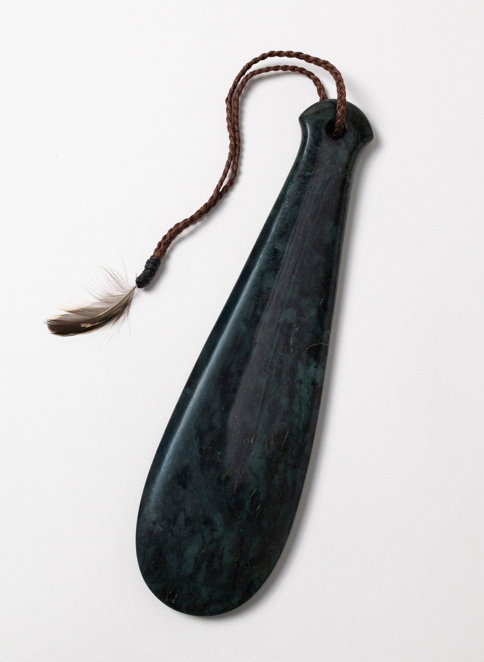 Mere Pounamu on Stone Base