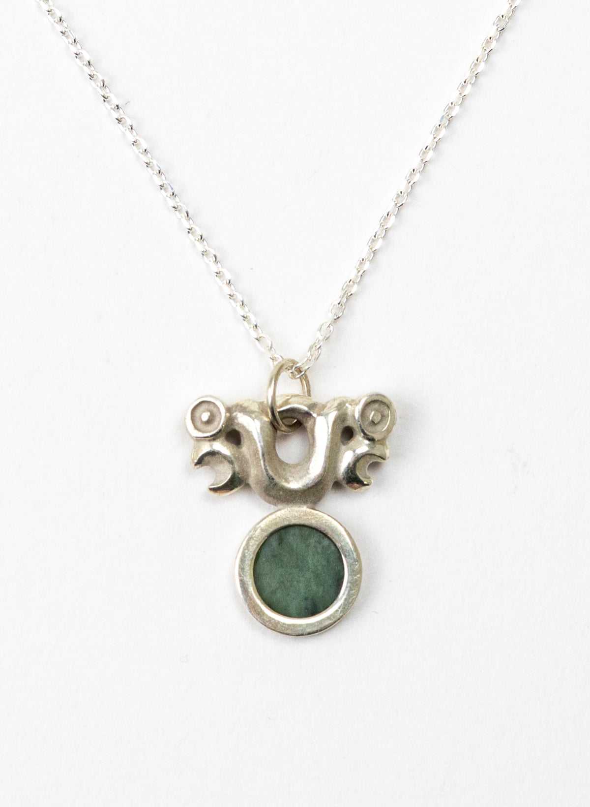 Silver Pekapeka Pendant with Pounamu Disc