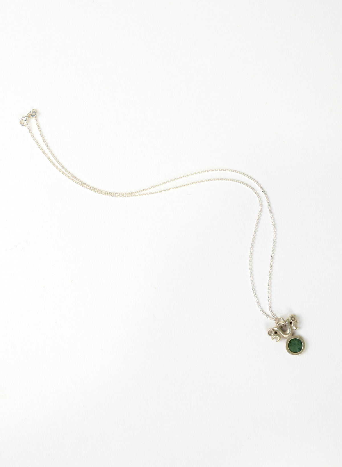 Silver Pekapeka Pendant with Pounamu Disc
