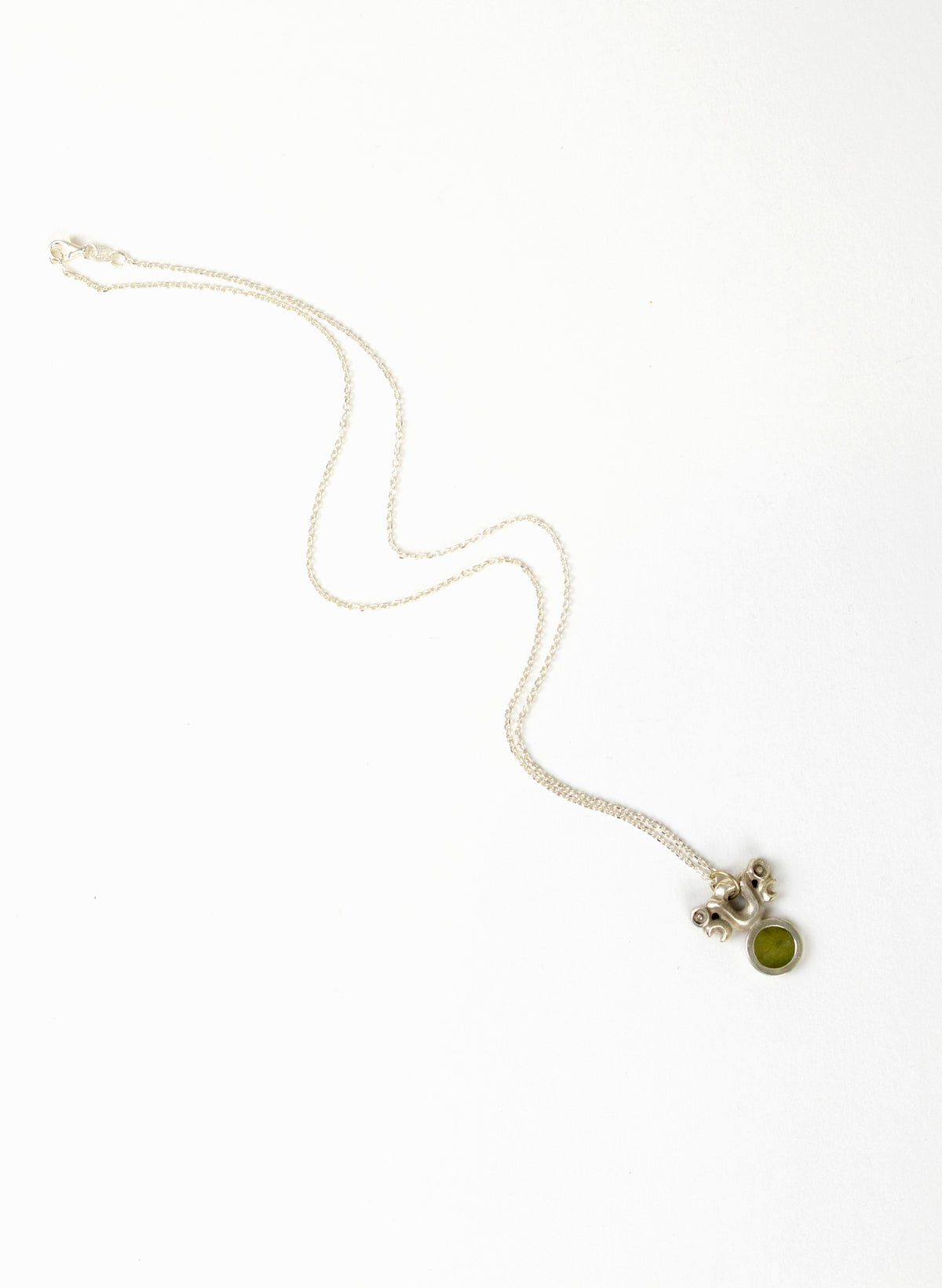 Silver Pekapeka Pendant with Pounamu Disc