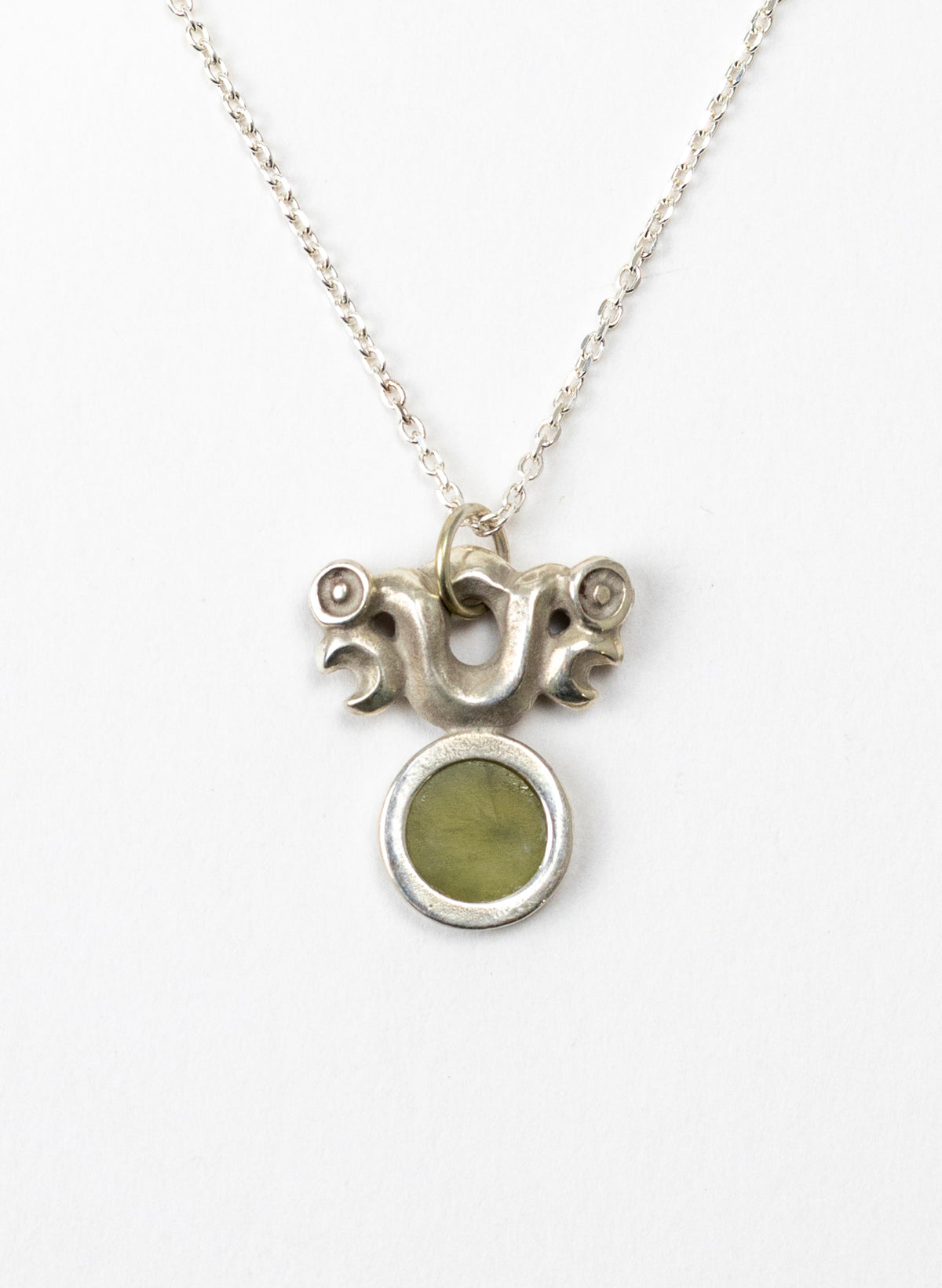 Silver Pekapeka Pendant with Pounamu Disc
