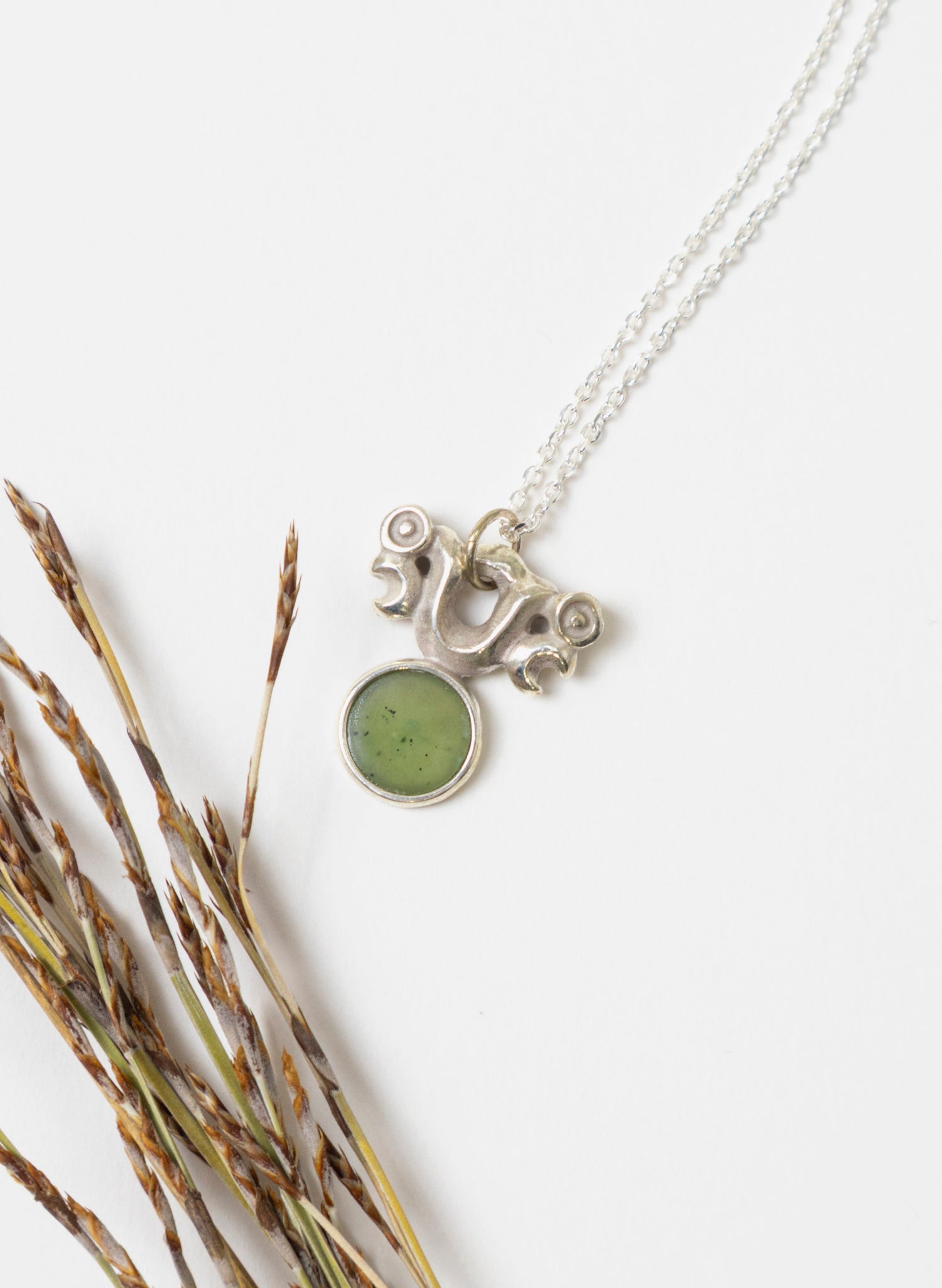 Silver Pekapeka with Pounamu Disc 