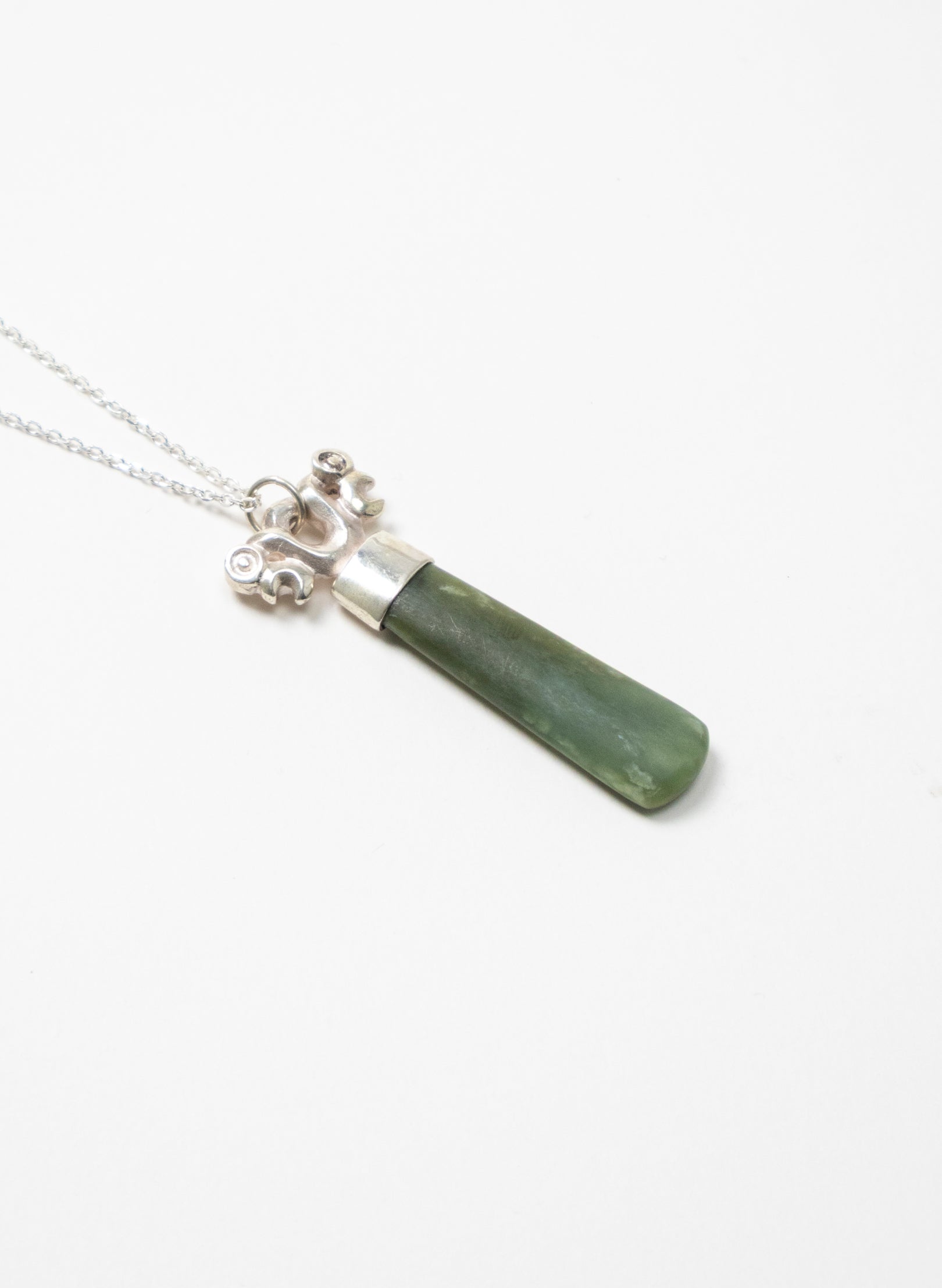Silver Pekapeka Pendant Pounamu Drop